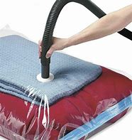 Image result for Compression Bags For Travel, Storage And Camping,12 Pcs (Small×4,Large×4,Jumbo×4) Roll Up Reusable Travel Space Saver Vacuum Storage Bags, No Vacuum
