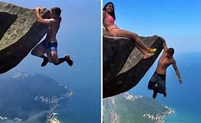 Image result for Guy Hanging Off Cliff