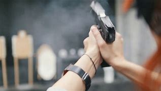Image result for Woman Shooting Pistol