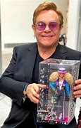 Image result for Elton John Singing Doll