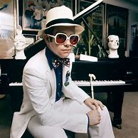 Image result for Elton John White Suit