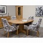 Image result for Round Extending Oak Dining Table