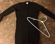Image result for Photo of Sweater Hanging On Hanger