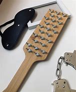 Image result for Spiked Paddle