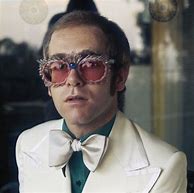 Image result for Elton John in the 80s White Suit