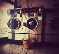 Image result for Laundry Baskets On Wall
