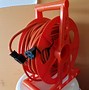 Image result for Snag Free Extension Cord Roll Up