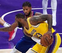 Image result for Paul George Lakers and LeBron James