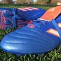 Image result for Orange Adidas Cleats