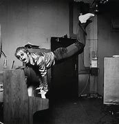 Image result for Elton John Handstand