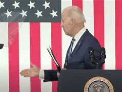 Image result for Biden and Warren Shaking Hands