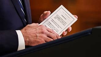 Image result for Biden Holding Book