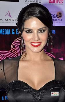 Sunny Leone Hot Skin Show In a Black Seethrough Dress At PV