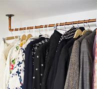 Image result for DIY Hanging Clothes Rack From Ceiling