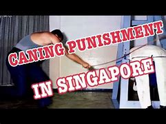 Image result for Singapore Cane Beating