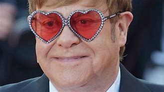 Image result for Elton John with Heart Glasses