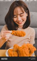 Image result for Person Eating Chicken