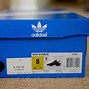 Image result for Black and Gold Adidas NMD