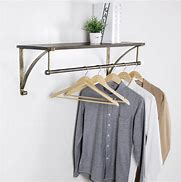 Image result for White and Gold Wall Mounted Hanging Clothes Rack with Shelves