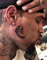 Image result for Chris Brown Wrist Tattoos