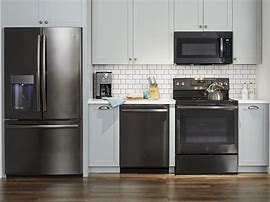 Image result for Kitchen Cabinets Black Appliances with Stainless Steel