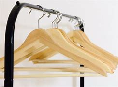 Image result for Suit Hangers Wood