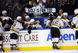 Image result for Hockey Fan Holding Sign