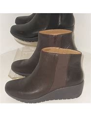 Image result for Easy Spirit Womens Valor Winter Boots Flat Heel, 6 Medium, Brown