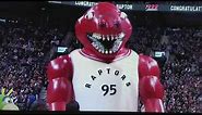 Inflatable raptor and his inflatable friends dance (Toronto)
