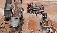 Fantastic Teamwork Action at its Best! Dump Truck Delivers Earth Stone Material With Bulldozer Operated to Spread Earth Stone to Low Land