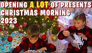 OPENING A HUGE PILE OF CHRISTMAS PRESENTS 2023 - CHRISTMAS MORNING