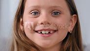 Cute little girl smile close up. Nice blue eyes gaze. Happy child portrait. One joyful kid face. Young person look camera. Funny woman posing. Playful childhood. Milk teeth. Pupil have fun. Head shot