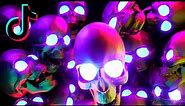 neon skulls with glowing eyes halloween 4k Tiktok Background/wallpaper