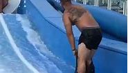 Guy's Pants Come off Riding Surf Slide - 1022927