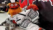 Flyers Mascot Gritty Bonds with Famous Emotional Support Alligator at Philadelphia Hockey Game