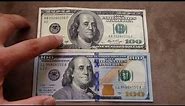 Comparing the new $100 US dollar (Oct 2013) with the old $100 bill.