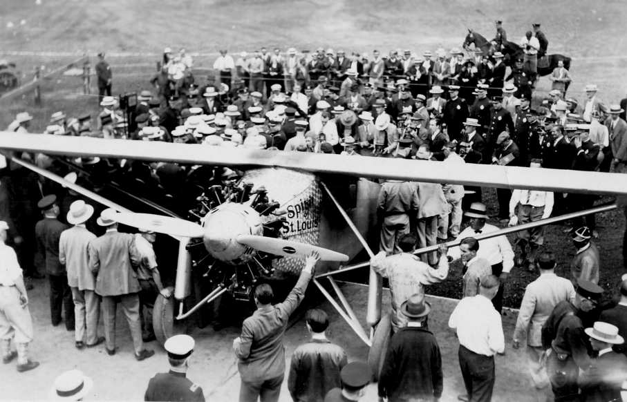 May 21, 1927 - aviator charles lindbergh lands in paris after the first solo air crossing of ...
