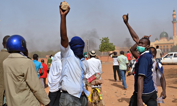Niger rioters torch churches and attack French firms in Charlie Hebdo ...