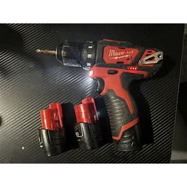Milwaukee M12 2407-20 Cordless Drill/Driver - Red With Spare Battery