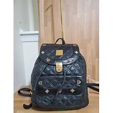 Mcm Bags | Authentic Mcm Black Quilted Leather Stark Gold Embellished Backpack | Color: Black | Size: Os