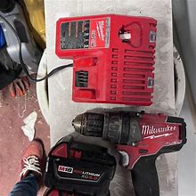 Milwaukee Fuel Drill W/ 2 5.0 Batteries & Charger | Color: Red