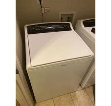 White Whirlpool Cabrio Washing Machine And Whirlpool Dryer.