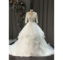 Regal Classic 3/4 Sleeves, Tiered Ball Gown Wedding Dress. Also Available In Black And Red Color.