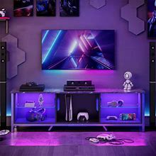 Wrought Studio™ Blagoje TV Stand W/ LED Light For 75 Inch TV, Modern Gaming Entertainment Center W/ Glass Shelves Wood/Metal In Black | Wayfair