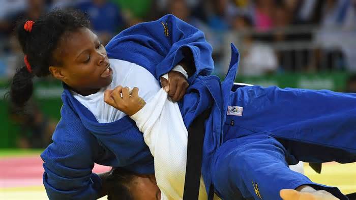 Nepal's Phupu Lamu Khatri (white) competes with Cuba's Maricet Espinosa during their women's -63kg judo contest match of the Rio 2016 Olympic Games in Rio de Janeiro on August 9, 2016.