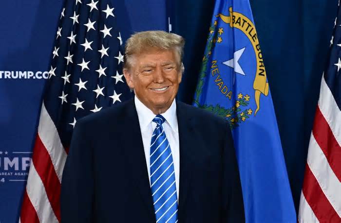 Former US President and 2024 presidential hopeful Donald Trump smiles as he arrives to speak at a Commit to Caucus Rally in Las Vegas, Nevada, on January 27, 2024. (Photo by Patrick T. Fallon / AFP) (Photo by PATRICK T. FALLON/AFP via Getty Images) (Photo: PATRICK T. FALLON via Getty Images)