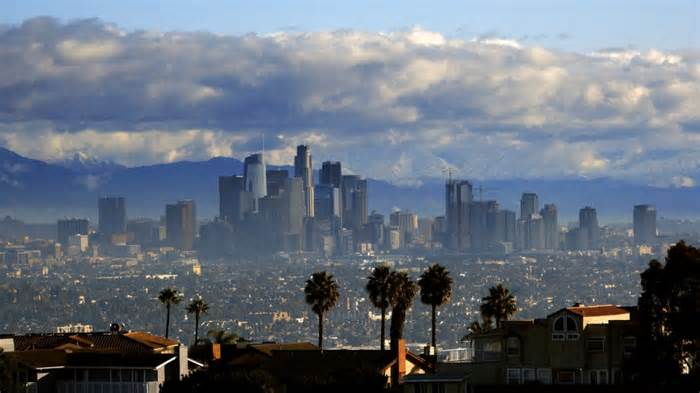 The skyline of downtown Los Angeles is shown.