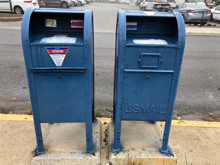 Two USPS collection boxes outside the Stroudsburg post office on Ann Street.