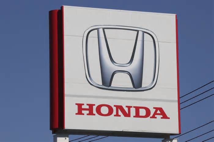 FILE - The logo of Honda Motor Co., is seen in Yokohama, near Tokyo on Dec. 15, 2021. Honda is recalling nearly 250,000 vehicles in the U.S. because bearings can fail, causing the engines to stall and increasing the risk of a crash. The recall covers certain 2018 and 2019 Honda Pilot SUVs and Odyssey minivans, and some 2017 and 2019 Ridgeline pickup trucks. (AP Photo/Koji Sasahara, File)