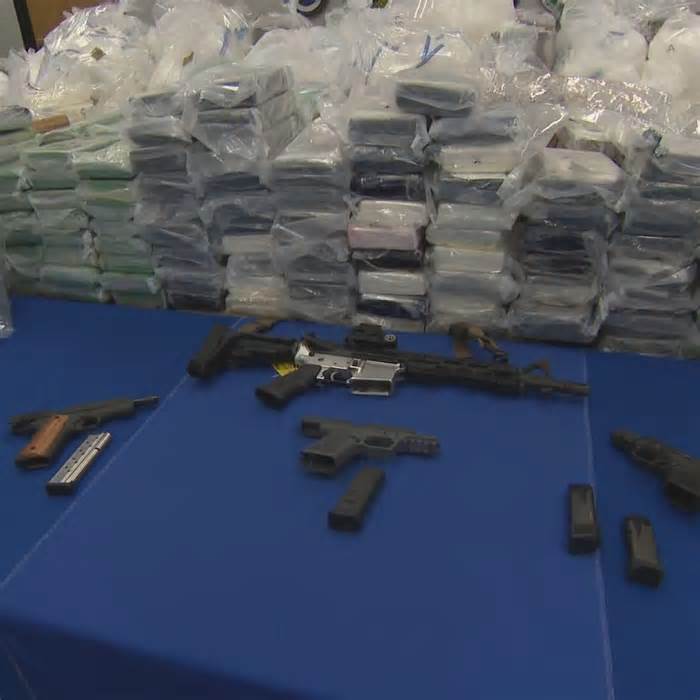 Federal authorities display weapons and narcotics seized as part of 